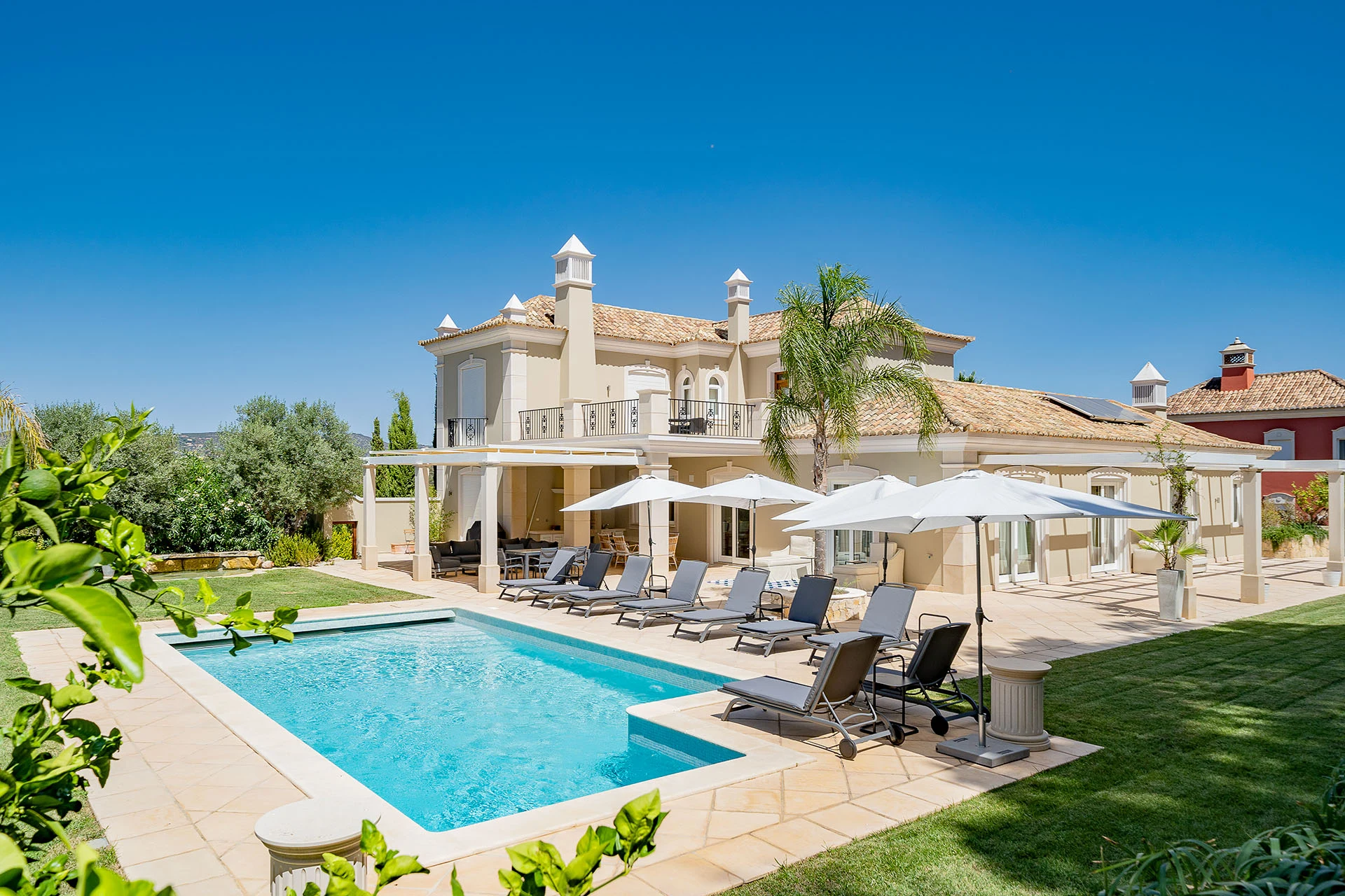 Luxury villa in the Algarve with a private pool, landscaped garden and shaded terrace