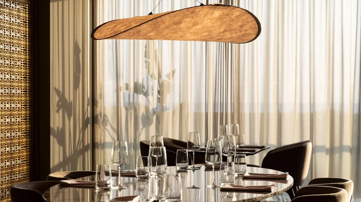 Set dining tables and contemporary lighting at Algarve Marriott Salgados.