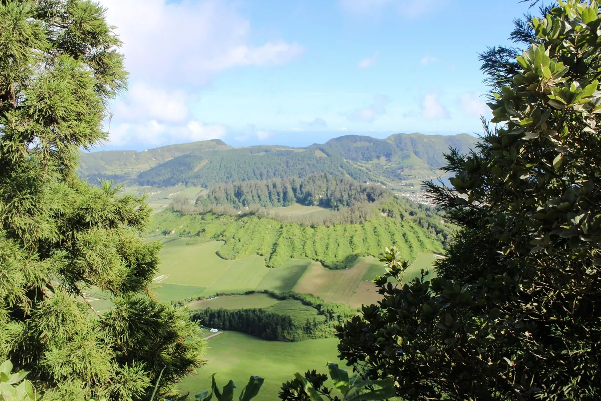 The Sete Cidades crater landscape, with wooded ridges and lakes below.