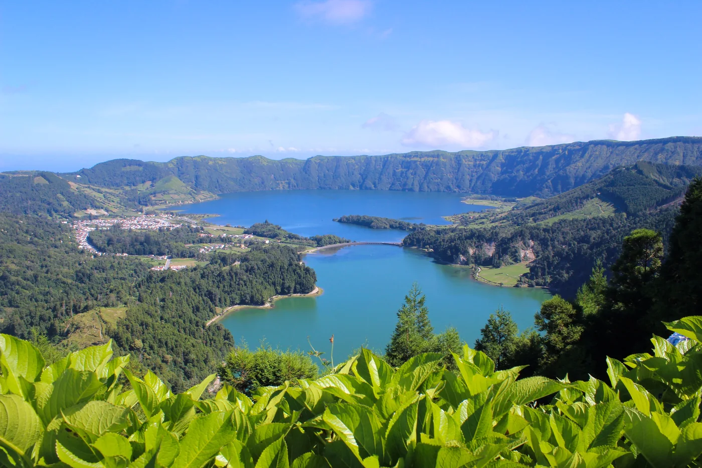 The crater lakes of Sete Cidades surrounded by green slopes.